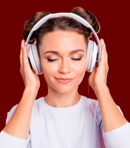 Young woman wearing headphones, listening to music