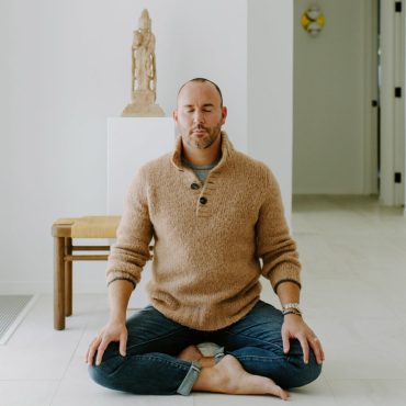 Curator Joshua Smith meditating