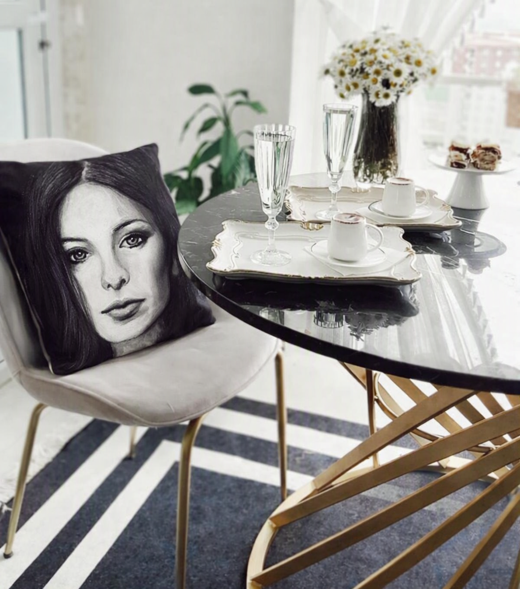 Pretty dining table and chair with cushion featuring a woman's face